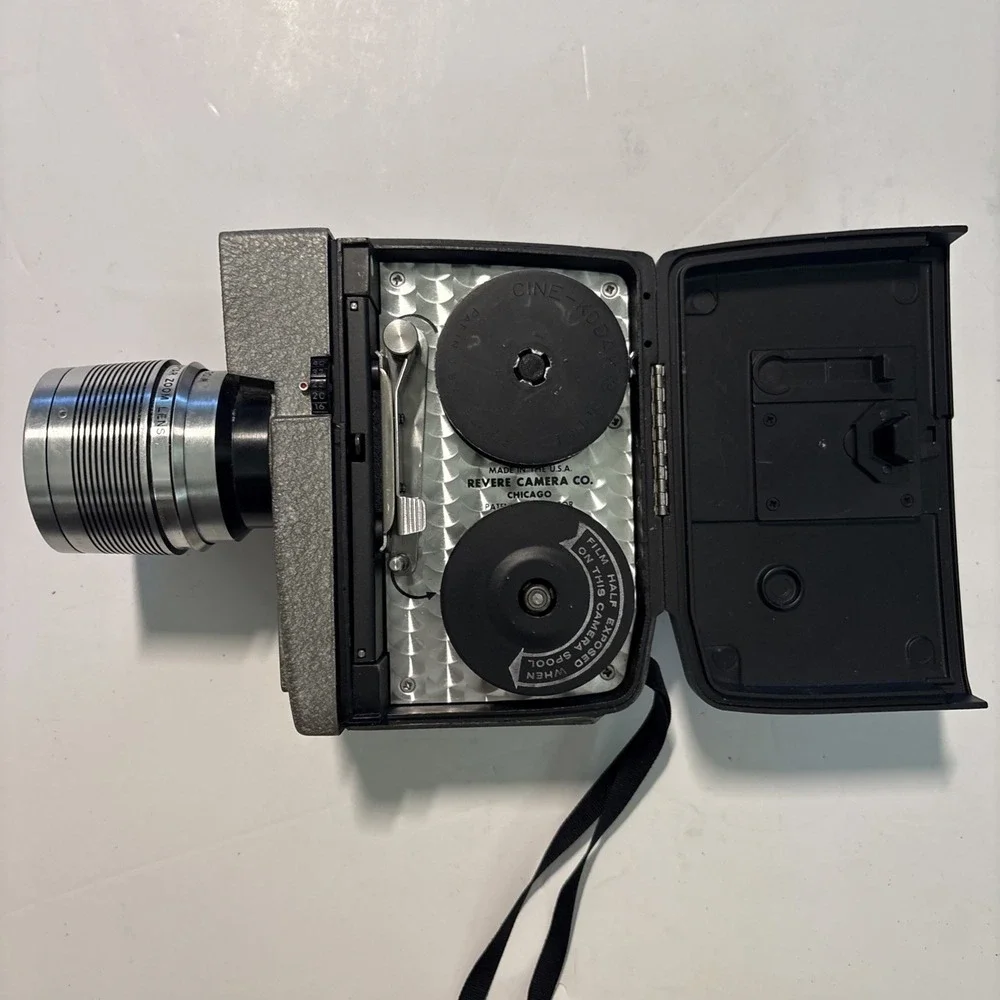 The Revere Model 118D Eye Matic 8mm Movie Camera Power Zoom Telephoto Wide Angle